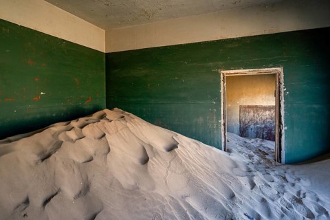 Former dwelling house full of sand, Kolmanskop, restricted diamond area, Karas region, Namibia