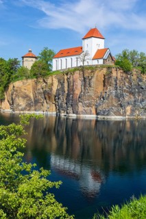 Mountain church and water tower on the Kirchberg, surrounded by the Kirchbruch quarry lake,