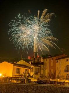 Fireworks from the Scaliger castle in the foreground Houses of, Borghetto, Valeggio sul Mincio,