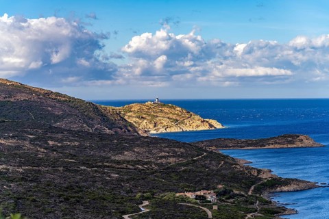 The La Revellata peninsula with the Phare de la Revellata lighthouse near Calvi, Balagne, Corsica,