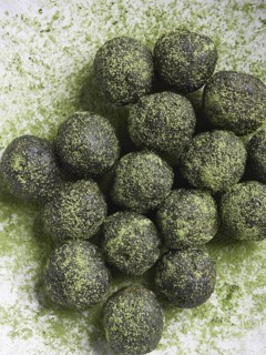 Green tea matcha truffles or bliss balls. Energy balls. Healthy raw desserts. Top view