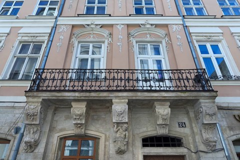 Decorative balcony of a 19th century tenement house, Lviv, Ukraine