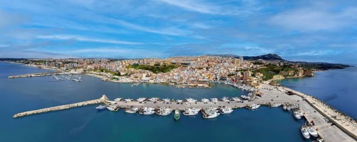 Aerial view, panorama, harbor in front, fishing port, fishing boats, ships, marina on the left,