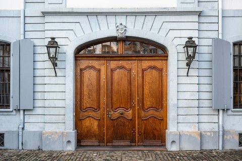 Portal, entrance door Oakwood door from the Seidenhof, a baroque building in the old town of