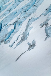 Blue rugged glacier ice with crevasses and snow, detail, Exit Glacier, Kenai Peninsula, Alaska, USA