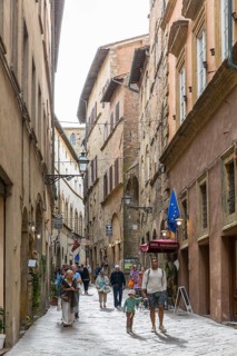 Typical street in the historic centre of Volterra, province of Pisa, Tuscany, Italy