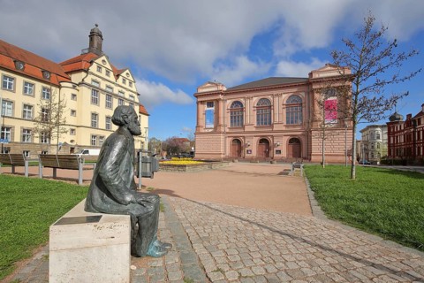 Classicist theatre square with state theatre, district court and sculpture by optician, physicist