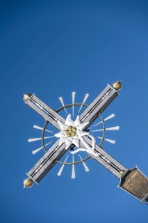 Summit cross with edelweiss, Sonntagshorn, Chiemgau Alps, Bavaria, Germany