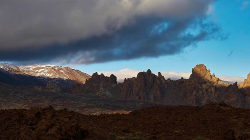 Llano de Ucanca, Dramatic clouds over rocky mountains with shadows and light effects, Teide, Parque