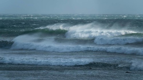 Ocean waves, strong surf, west coast of the Taranaki region, North Island, New Zealand