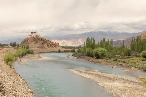 Stakna Monastery perched on a hill by the serene Indus River in Ladakh, India. Set against the