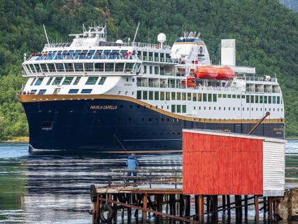 Havila voyages, alternative provider on the Hurtigruten route, cruise ship passing the Raftsund,