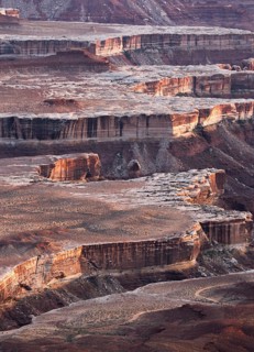 Aerial view of the breathtaking landscapes of Canyonlands National Park, showcasing dramatic cliffs