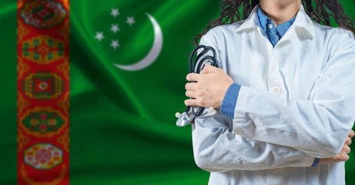 Healthcare professional with Turkmenistan flag background. Professional doctor holding stethoscope