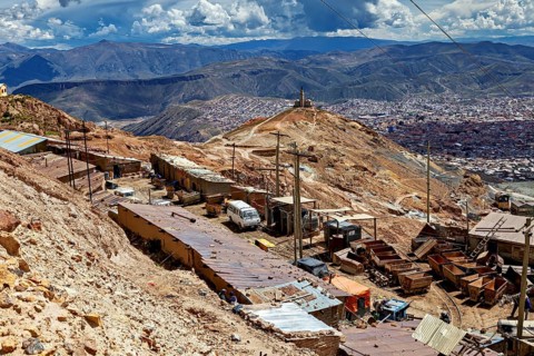 View from above of a residential complex in a mountainous landscape and cloudy sky, The Potosi