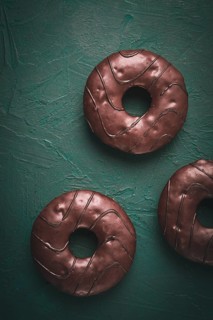 Donuts with cocoa, in chocolate glaze, top view, no people