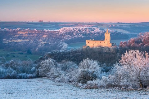 View of the landscape in the Saale valley with hoarfrost in winter, Rudelsburg castle ruins in the