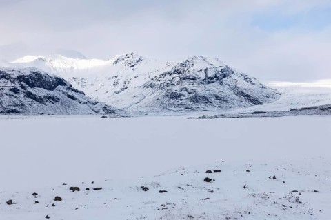Lava rock field, mountain range, snow, winter, Vatnajökull region, Iceland, Scandinavia