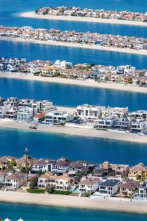 Artificial island in the shape of a palm tree The Palm Jumeirah with luxury villas and beachfront