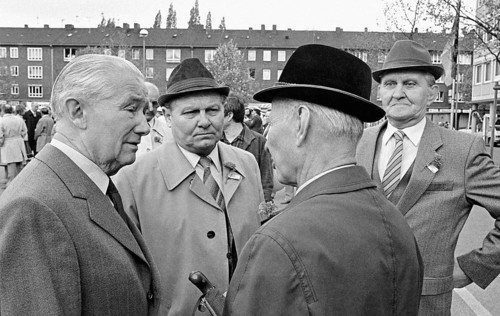 Gelsenkirchen, DEU - 01.05.1983 - Men have gathered on the market square in Gelsenkirchen, May 1st