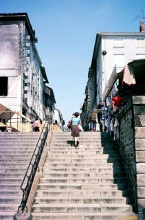 Stone staircase to the shops in Limoges, Haute Vienne department, south-west France 1976