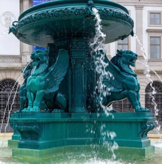 Sculpture lions historic Fountain of Lions, Fonte dos Leões, Praça de Gomes Teixeira square, city