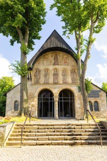 Remains of a historic church in Romanesque style with original vestibule made of natural stone from