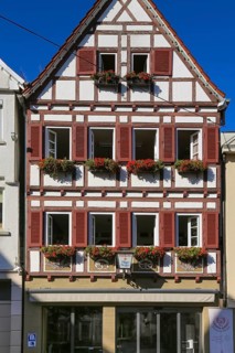 Half-timbered house, bakery Berger, organic bakery Hugo Berger, window shutters, flower decoration,