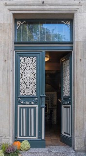 Old front door with decorative ironwork, Münsterland, North Rhine-Westphalia, Germany