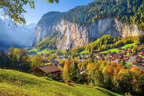 View of town and valley with Staubbach waterfall in autumn, Lauterbrunnen, Bernese Oberland, Canton