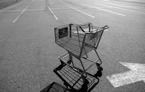 Empty shopping cart in a supermarket parking lot, black and white, Blairstown, New Jersey, USA