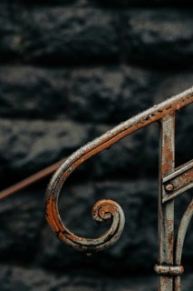 Detail of a banister to the parish church, St Peter, Villnöß, Funes, Villnößtal, South Tyrol, Italy