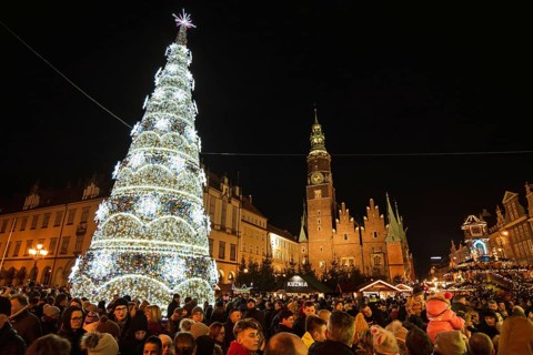 WROCLAW, POLAND - DECEMBER 08, 2018: Christmas fair in the market square of Wroclaw with the city