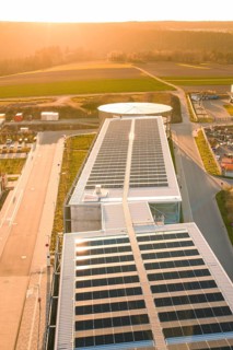 Large solar panels on a modern building in sunlight, new hospital at the Verbund Südwest Clinic,