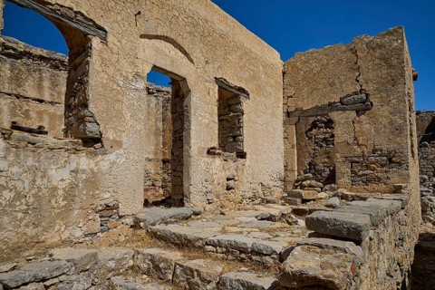 Dilapidated walls of an old stone structure under blue sky, Lost Place, Mikro Chorio, Church of the