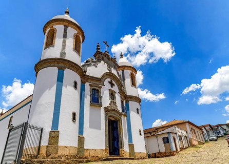 Street in the historic city of Congonhas in Minas Gerais with an old baroque church, Congonhas,