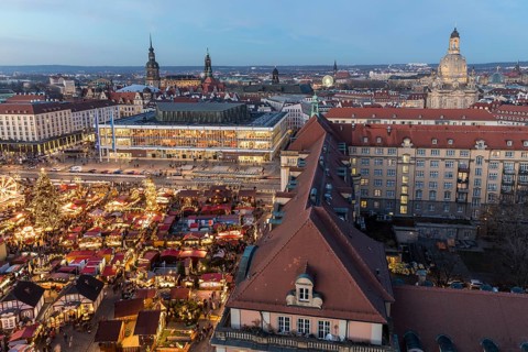 Striezelmarkt Christmas market and the old town from above with castle, Kulturpalast and Church of