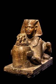 Statue of Ramses II as a sphinx offering a vessel with a ram's head from the exhibition: Ramses the
