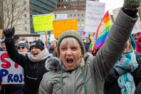 Lansing, Michigan USA - 5 February 2025 - People rally at the Michigan state capitol to oppose