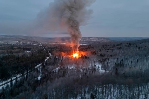 House fire in a forest area, Region of La Mauricie, Province of Quebec, Canada