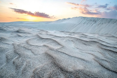 Sunset, white sand dunes in the Khaluf desert, Oman