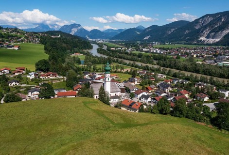 Drone image, view of village with parish church, Breitenbach am Inn, Inntal, Tyrol, Austria