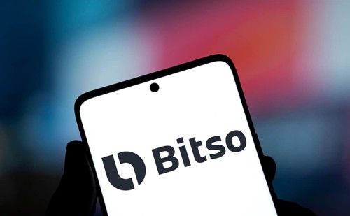 Bitso logo is displayed on smartphone. Bitso began as a global cryptocurrency exchange company