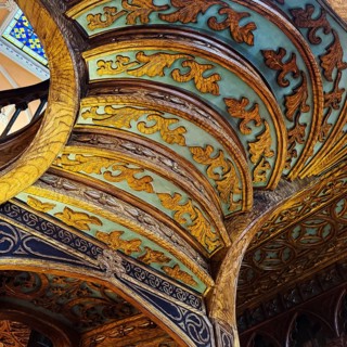 Livraria Lello, interior view of the Lello bookstore with rich decorations of the curved wooden