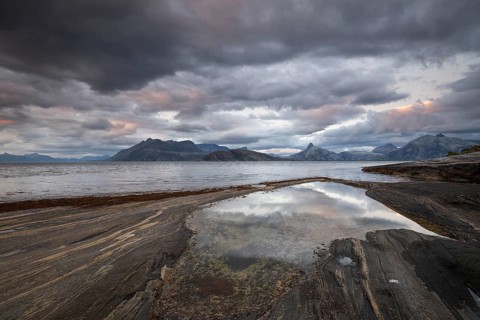 The Vestfjord in Nordland, Norway, offers a dramatic atmosphere near Bodø. Dark clouds are