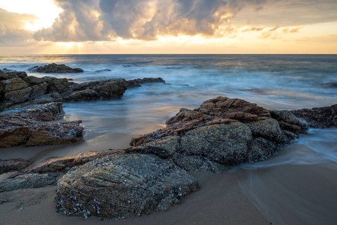 Sunrise on the beach, coast near Sadah, Oman