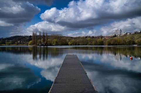 Boat dock, jetty leads in Max-Eyth-See, Hofen, behind Freiberg near Stuttgart, Baden-Württemberg,
