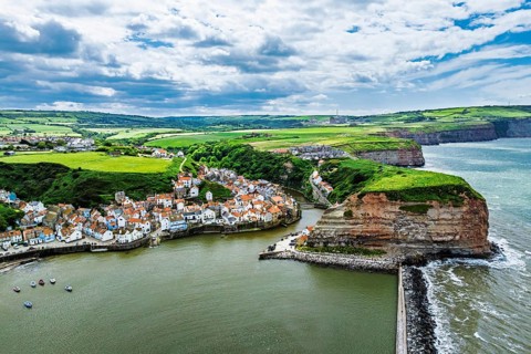 Staithes Village from a drone, North Yorkshire, North York Moors National Park, England, United