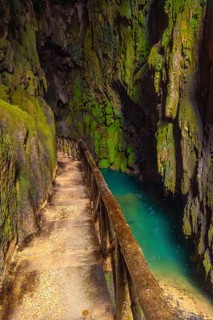 Interior of the Iris Grotto at the Cola de Caballo Waterfall in the Monasterio de Piedra Natural