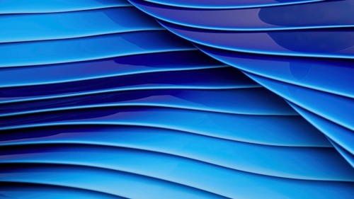 Curved abstract layers in deep blue tones evoke a sense of fluid motion and depth, creating an